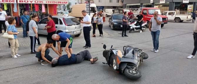 Motosiklet sürücüsü köpeğe çarpmamak isterken düşerek yaralandı