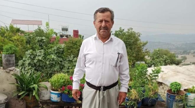 Yaz-kış beyaz giyinen muhtar kalp krizi geçirdi